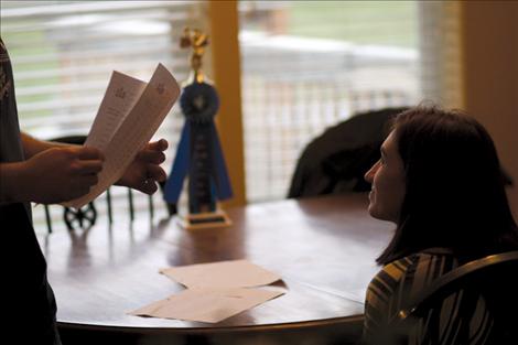 Mike helps Suzanah study for the state competition with her Lake County Spelling Bee trophy in the background