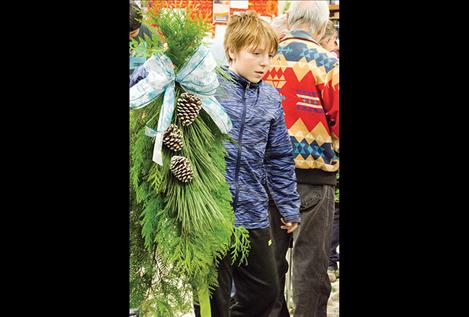 Karen Peterson/Valley Journal Students help make holiday decorations to support the Dogs with Wings project.