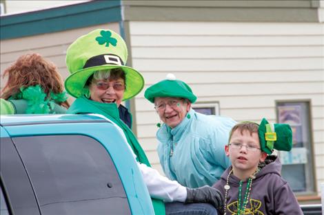 Carlene Bockman, Mardene Skogen and Trenton Burland enjoy their ride in the parade.