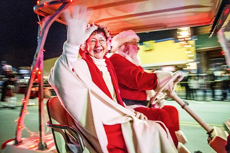 Santa and Mrs. Claus wave to the parade crowds.