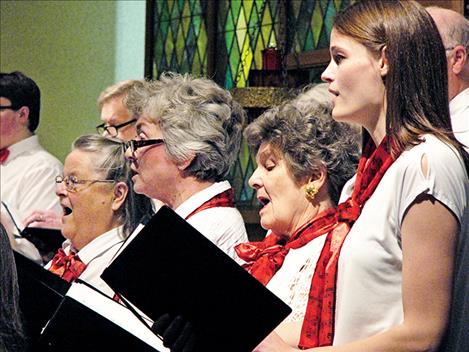 Evelyn Stanley, Nancy Teggeman, Jan Dybdal and Betsy Wade sing at Sunday’s annual   Christmas concert. 