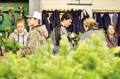 Mission Valley FFA students build wreaths to raise funding for programs that allow them to learn about job skills and food production. 