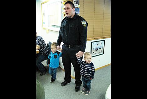 Gilliland stands with his two boys, Matthew, 3, and Andrew, 2.