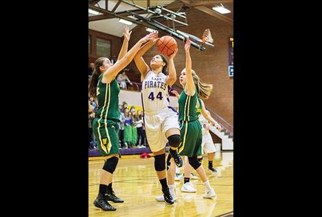 Lady Pirate Olivia Perez drives the lane.