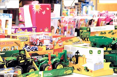 People donate toys to the Share the Spirit program and Toys for Tots. 