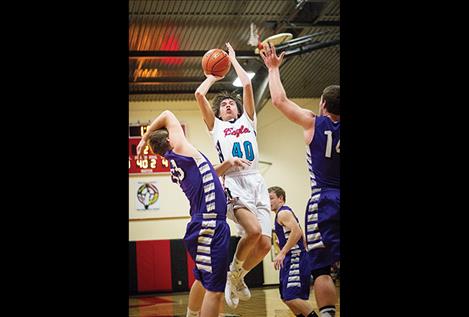 Eagles Brandon Larios soars for two.