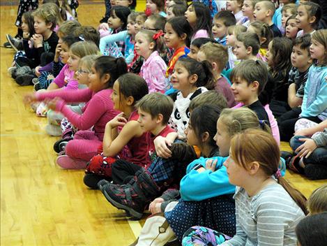 Linderman Elementary students listen to the Polson High School Connection choir sing last week. 