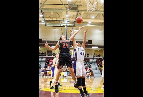 Ronan Maiden Madeline McCrea battles Polson Lady Pirate Olivia Perez for the rebound.