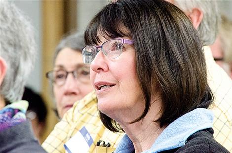 Elaine Meeks, Mission Valley Rises co-founder, listens to the speaker.