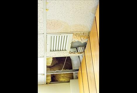 Ceiling tiles broke apart when water pushed its way into the classroom.   