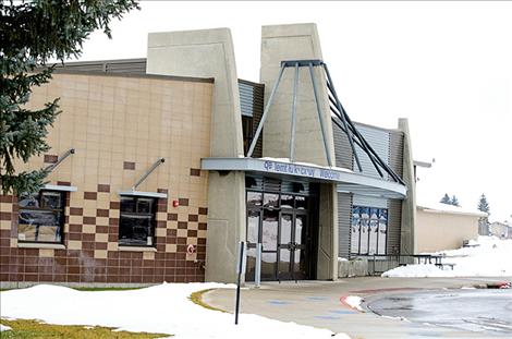 new entrance is nice but he wishes the money would have been used to fix the roof instead.