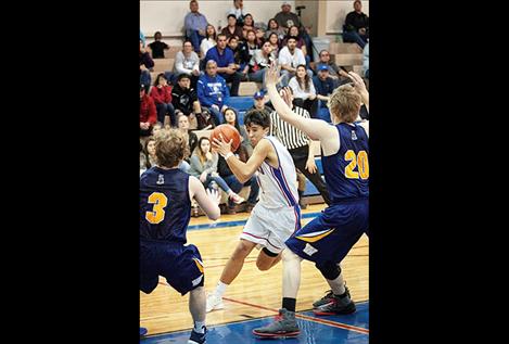 Bulldog Jacob Hugs makes a strong move to the hoop.