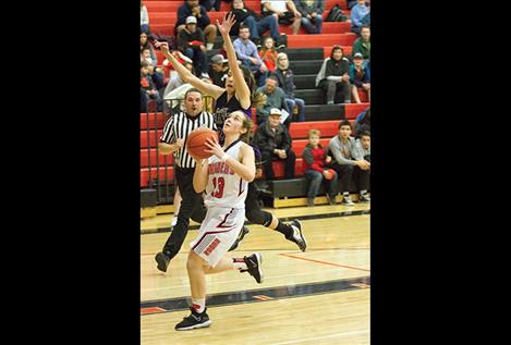 Ronan Maiden Reagan Clairmont slips past a defender.