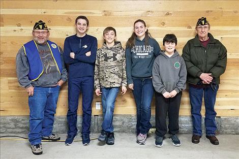 American Legion Chairman Melvin Quakenbush, Conner Cornwell, Colter Cornwell, Mesa Mckee, Sackett Andres and Assistant Chairman Richard Tobel pose for a photo.