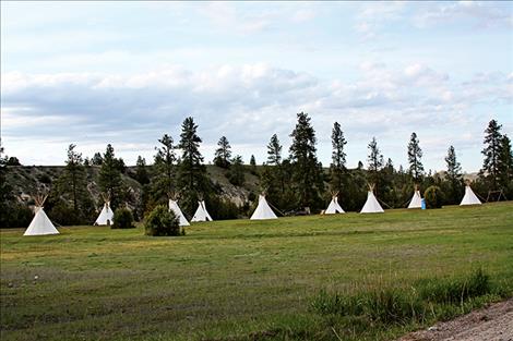 CSKT land use planning seeks to preserve sensitive land areas and doesn’t allow for subdivisions along the Flathead River corridor or in buffer zones adjacent to tribal wilderness unless they are in an existing clustered site. Pictured above is a river honoring encampment along the Flathead River.