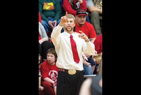 Arlee’s head coach  Zanen Pitts directs  his offense.