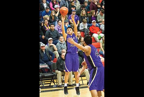 Pirate Asa Askan launches a three-pointer.