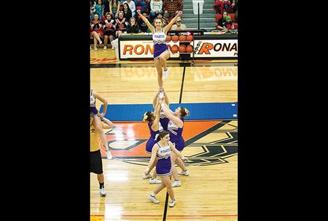 The Polson Pirate Cheer Squad entertains fans at  half time.