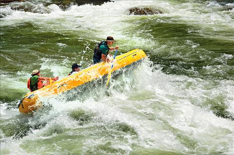 Activities for veterans include rafting in the Alberton Gorge, above, or ice fishing. At right, Jeremiah Mercer and Aubree Blevins fish on Mission Reservoir.