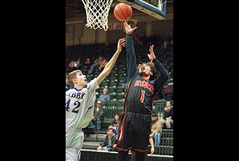 Ronan Chief Ezekiel Misa lays it up for a score.