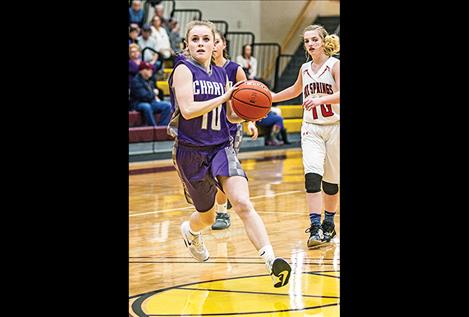 Lady Viking Kaitlin Cox races to the hoop.