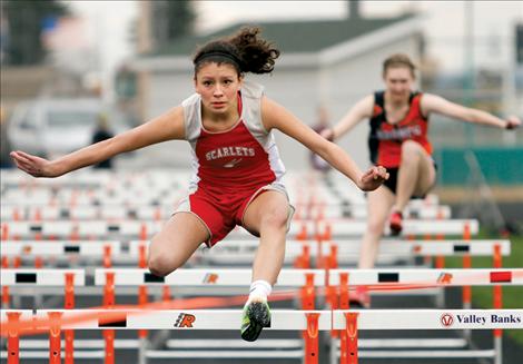 Rebecca Whitesell nears the finish of the girls’ 100-meter hurdles at the Ronan Invitational last week.