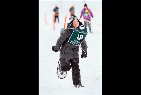 Kyler Gage pushes hard in the 50-meter race