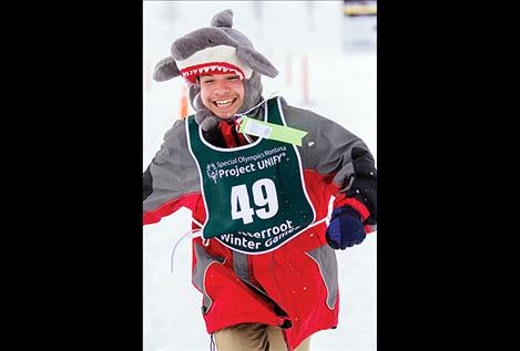  Martin Schlensker is all smiles as he crosses the finish line. 