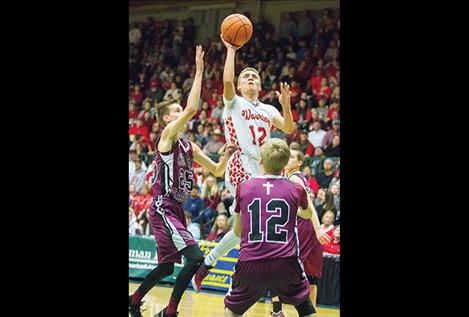 Arlee Warrior Greg Whitesell scores against Manhattan Christian.