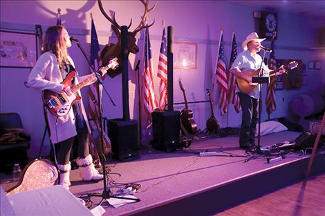 Rob and Halladay Quist entertain at the event.