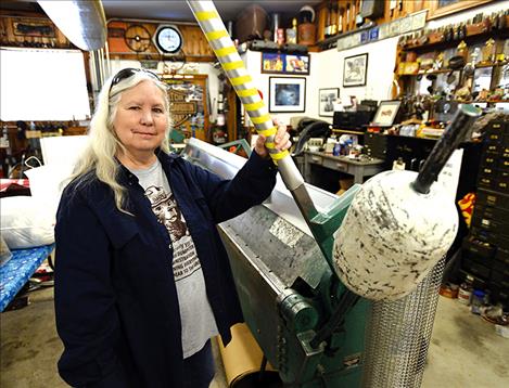 Lee Bridges stands in her sheet metal fabrication shop on her property in East Missoula where she lives. Bridges wants her community to come up with its own zoning designations through Missoula County rather than be zoned by the City of Missoula once they are annexed.