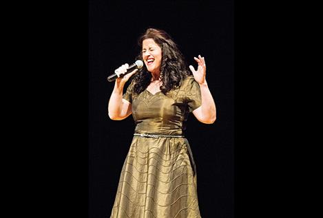 Third place finisher Cammy Maughan hits the high notes during her performance of “One and Only,"