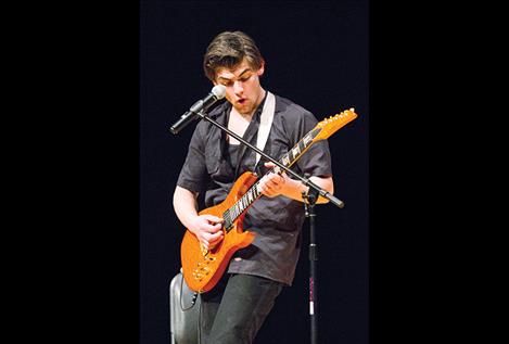 Local singer/guitarist Jordan Albert rocks the house