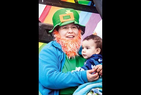 ll smiles, parade participants show their spirit with  a bit o' the Irish  symbols and colors.