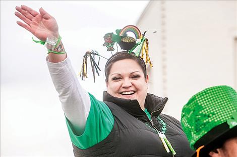 ll smiles, parade participants show their spirit with  a bit o' the Irish  symbols and colors.