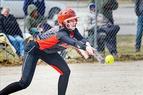 Ronan Maiden Madison Clairmont lays down a bunt against Libby.