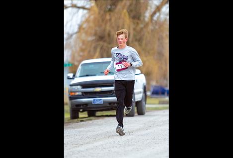 10k winner Wills DeGrandpre races down the home stretch.