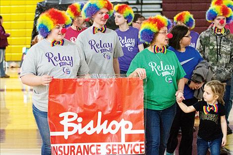 The Bishop team of clowns walks together during the event.  