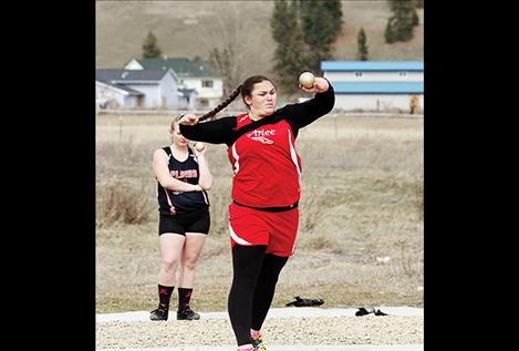 Arlee’s Peyton Lammerding throws in the shot put at Frenchtown on March 29. Her best throw of 33 feet 10 inches earned her third place.