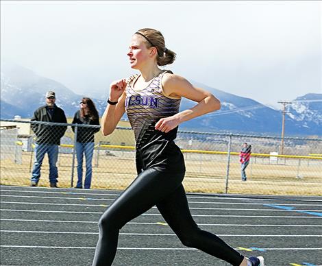 Polson’s Bea Frissell heads down the final stretch of the 800-meter at the Gene Hughes Invitational track meet on March 24. She finished in 2:32.37 seconds earning the Polson Varsity Girls their only first place in Corvallis.