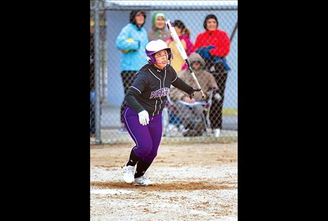 Polson Pirate Kaylanna DesJarlais watches as her ball drops for a base hit.