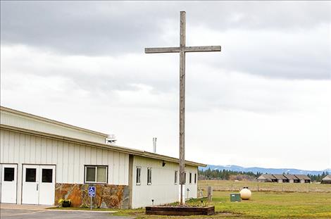 Calvin used the money to build that cross on the church grounds as a sign of forgiveness and to remind us to love one another.