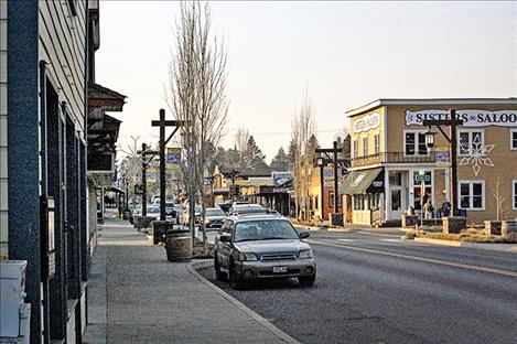 Developers of a nearby resort paid downtown businesses in Sisters, Oregon to remodel the front of their shops to adopt a western theme.