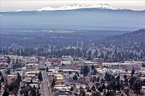 The city of Bend is only 22 miles away from the small town of Sisters. The small town has staved off becoming a bedroom community for Bend by carving out their own identity.