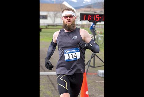 Men's half-marathon winner Michael Laforest of Missoula crosses the finish line with a time of 1:15.