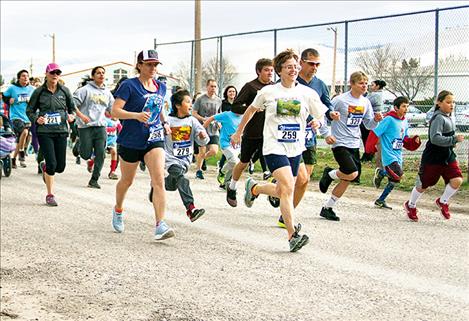 Runners are all smiles at the start of the 5K/10K.