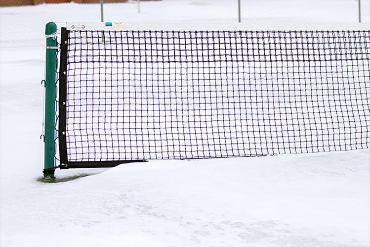 Polson's tennis courts were covered in snow last week.