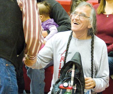 Joe Pablo greets a friend after being honored at an Arlee High School basketball game in early December. Pablo passed away just two weeks late from cancer. Last month, Pablo’s friend and weightlifting buddy Skip Schacher set a new state record in the bench press and dedicated his win to Pablo.