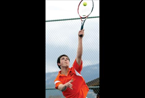 Logan Soukkala sends a serve to Mission’s Katz Yelsa March 28.