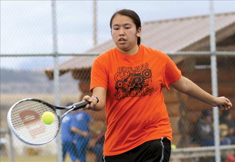 Amber Quequesah returns the ball during her match against Mission’s Briar Ahlborn March 28 in St. Ignatius.